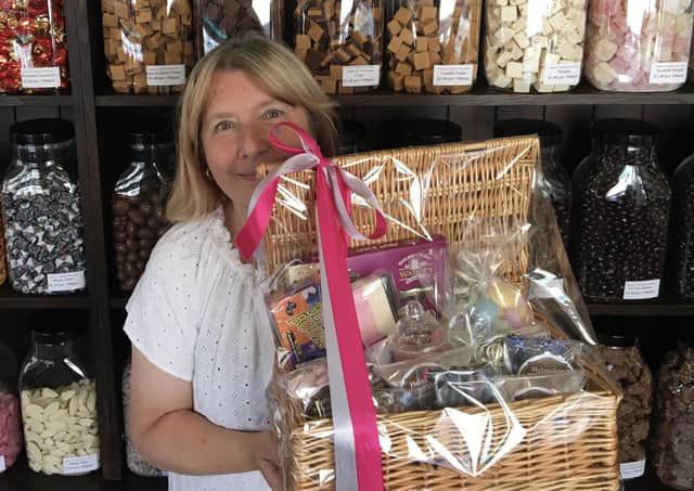 Lynn Hempsall, at Helmsley Traditional Sweet Shop, is selling raffle tickets for the amazing hamper. Photo submitted