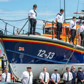 Younger members of Filey RNLI volunteer crew form the guard of honour
