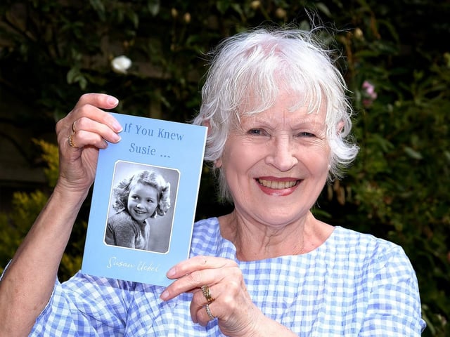 Sue Herdman with a copy of If You Knew Susie