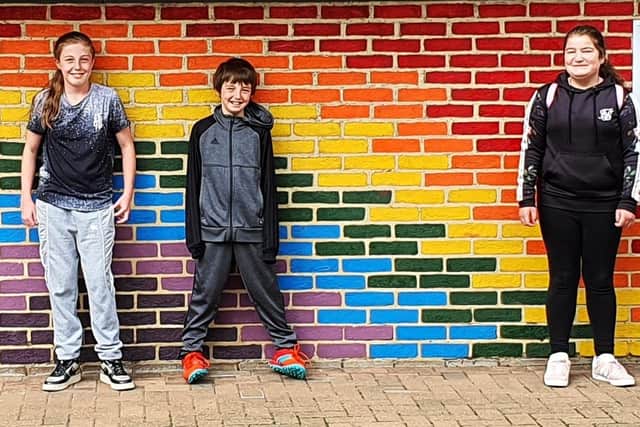 The Rainbow Wall at Graham School was painted by children of key workers during the Covid-19 lockdown.