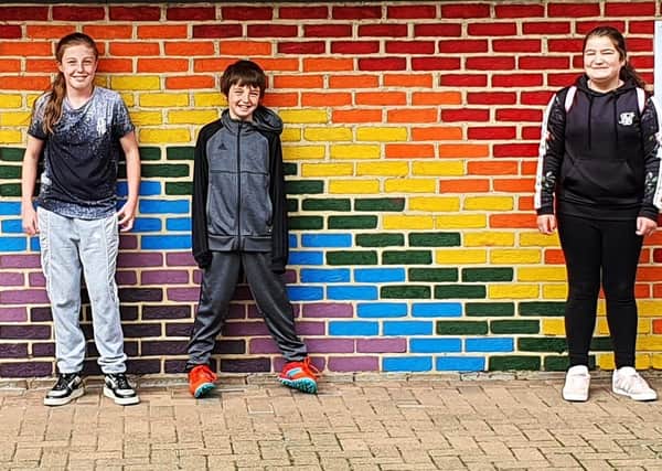 The Rainbow Wall at Graham School was painted by children of key workers during the Covid-19 lockdown.