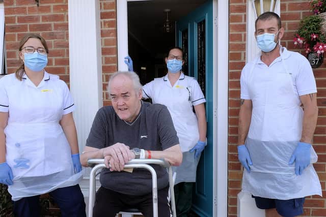Shaun Sullivan with physiotherapist Emma Foster, left, and occupational therapist Charlotte Boynton, from Scarborough Hospital, and Matthew Bennett , a Humber NHS Trust community physiotherapist.