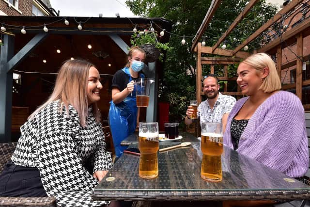 Enjoying a drink at The Courtyard.