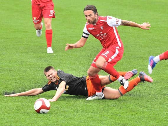 Dave Merris in action for Scarborough Athletic has joined Pickering Town as skipper