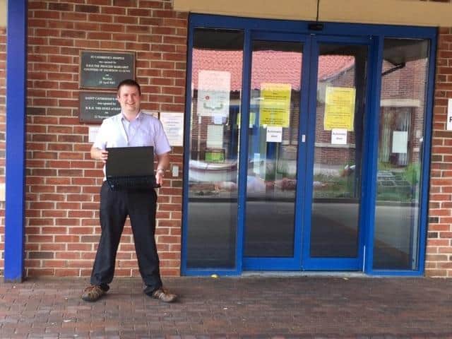 Rob Webb with the laptop.