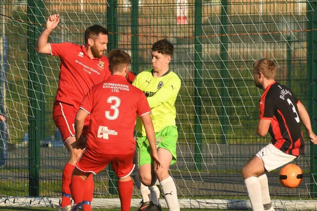 Chris Jenkinson, left, has committed to Brid Town for another season
