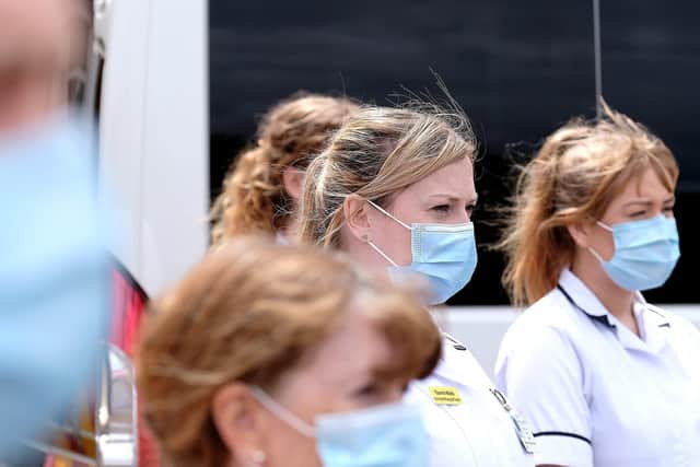 Staff at Scarborough Hospital pictured observing a two-minute silence for the NHS' birthday. No Covid-19 deaths have been recorded at the hospital for the past two weeks.