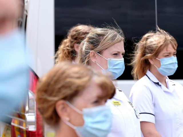 Staff at Scarborough Hospital pictured observing a two-minute silence for the NHS' birthday. No Covid-19 deaths have been recorded at the hospital for the past two weeks.