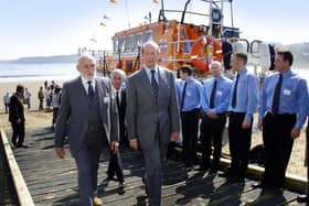 Sydney Garson, left, accompanies the Duke of Kent on a visit to Scarborough lifeboat station in May 2006.