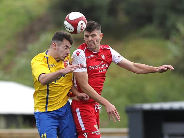 Matty Turnbull, pictured right during his time with Boro, is staying with the Pikes for another season
