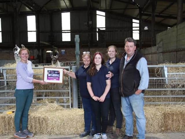 Playdale Farm Park family receive the Mumbler Award from Saraj Jane Barker