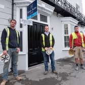 Wayne Roberts (WR Builders), Vincent Roberts (VR Property Developers), and Daniel Bradbury outside the Georgian House. The former pub has been converted into nine two bedroom apartments.