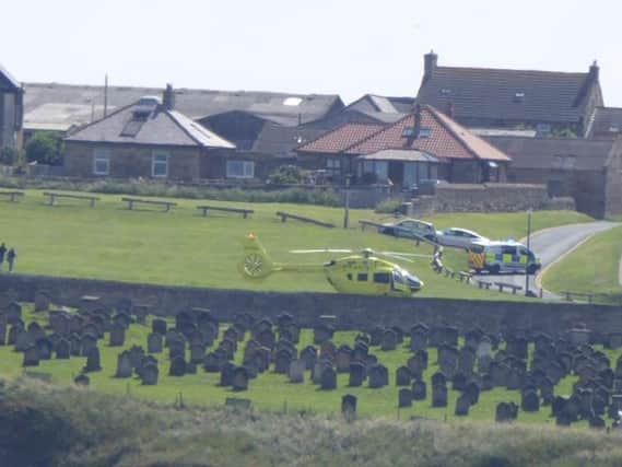 Yorkshire Air Ambulance at the scene near Whitby Abbey.