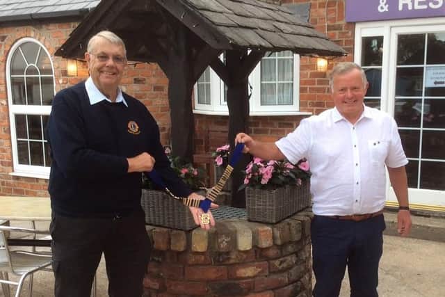 Keith Harris from Driffield (left) hands over the chain of office to the incoming president Paul Richardson from Speighton. Photo submitted