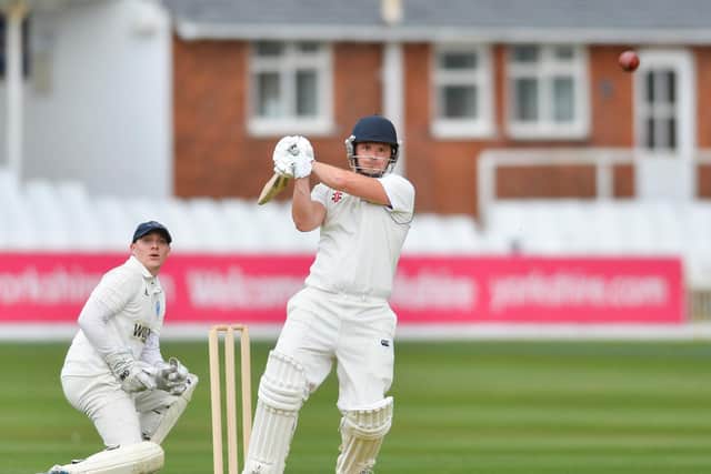 Nick Zakrzewski launches the ball into the leg-side during Scarboroughs defeat against Filey. PICTURES BY WILL PALMER / www.will-palmer.co.uk