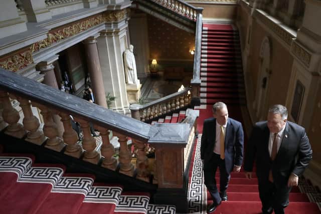 Foreign Secretary Dominic Raab (left), walks up the Grand Staircase inside the Foreign and Commonwealth Office (FCO) in London, with the United States Secretary of State, Mike Pompeo, as they arrive ahead of a working lunch. Pic: PA