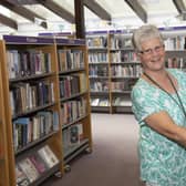Library volunteer Lesley Bessant ready to welcome browsers back