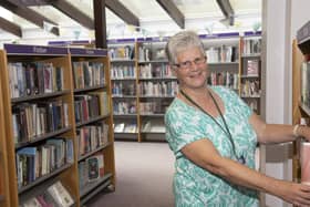 Library volunteer Lesley Bessant ready to welcome browsers back