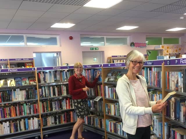Jane Pottas and Jacqueline Byers, volunteers at Whitby Library.