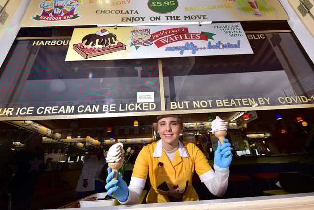 The new exterior serving area with Tori Dawson and a Covid-19 message.
It reads: "Our ice cream can be licked but not beaten by Covid-19"