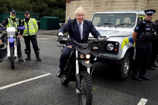 Boris Johnson on one of North Yorkshire Police's off-road bikes.