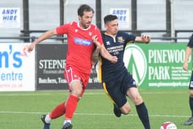 Pete Davidson, left, in action for Scarborough against Brid Town's Joe McFadyen last season