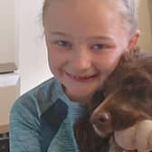 Nawton schoolgirl Grace Smith is pictured with her dog Tilly.