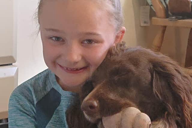Nawton schoolgirl Grace Smith is pictured with her dog Tilly.