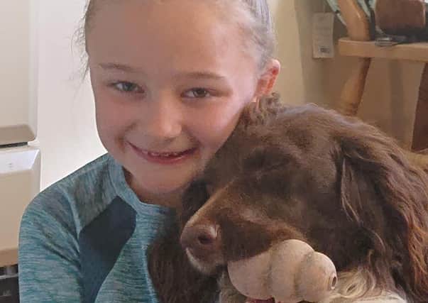 Nawton schoolgirl Grace Smith is pictured with her dog Tilly.