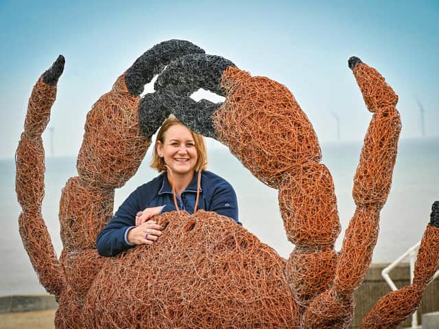 Artist Emma Stothard with giant crab