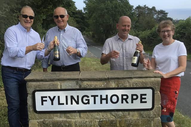 B&B owners Paul and Malcolm Laverack and Des and Heather Weston celebrate their Tripadvisor Travellers Choice Awards success.