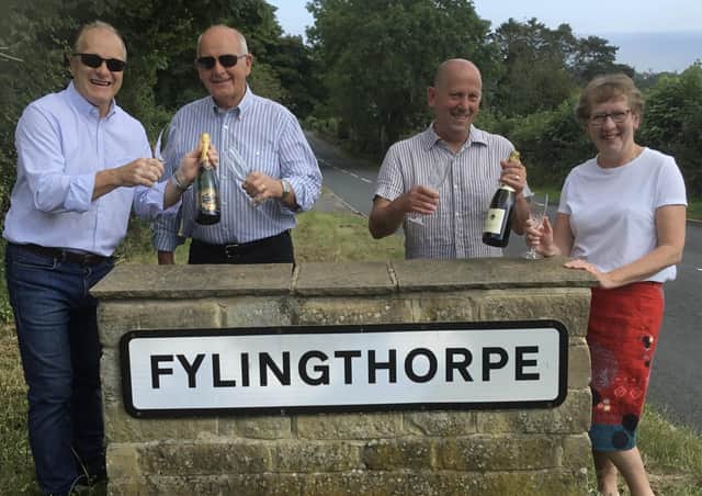 B&B owners Paul and Malcolm Laverack and Des and Heather Weston celebrate their Tripadvisor Travellers Choice Awards success.