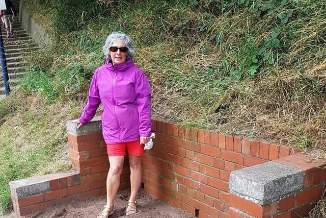 Stephanie Luxton at the site where the phone box was removed.