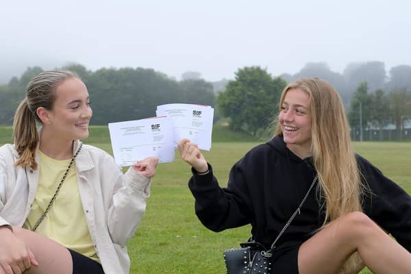 Sixth Form College: Ellie Smith and Amber Mason with their results.