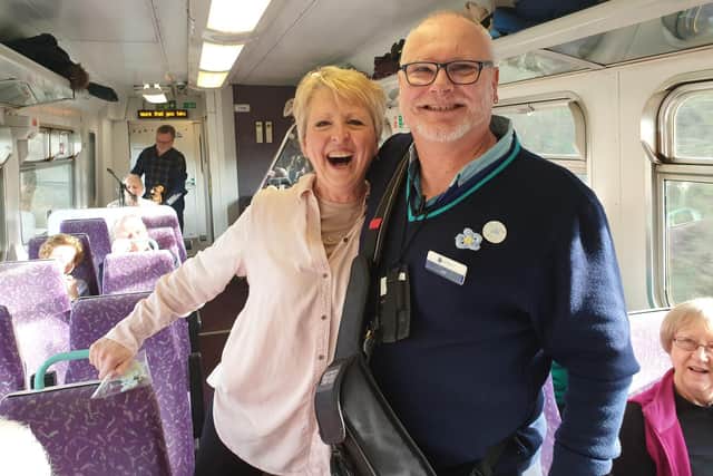 Carole from Nunthorpe knitters with train guard Jon