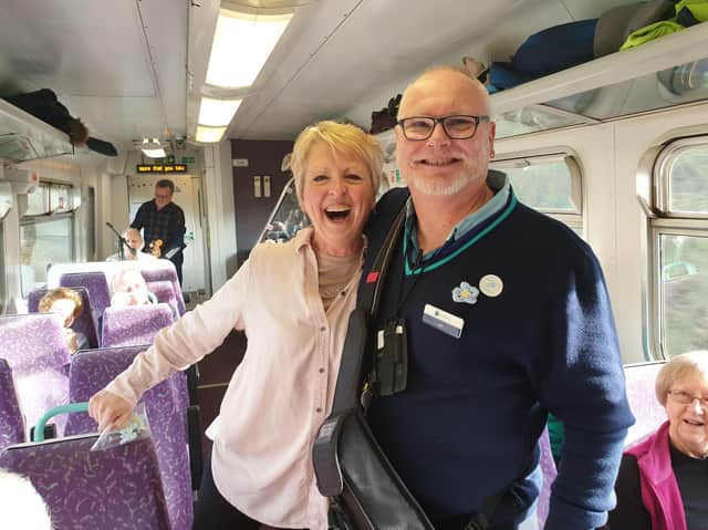 Carole from Nunthorpe knitters with train guard Jon