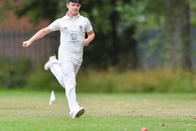A Filey fielder chases the ball