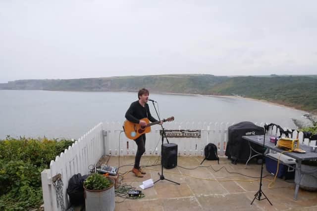 Alistair had help from the family to carry his music equipment