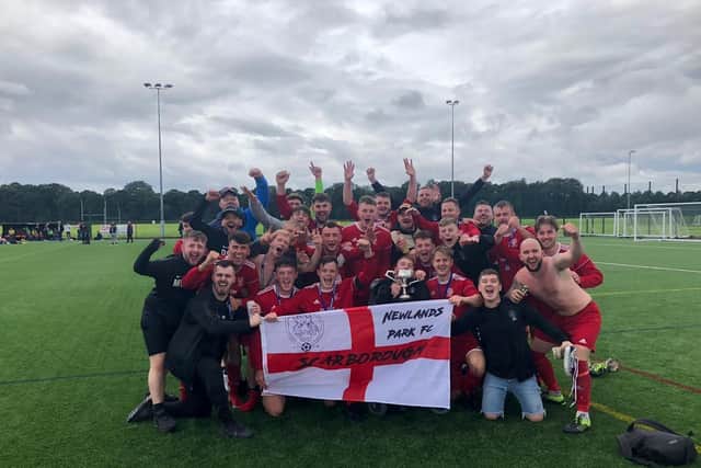 Newlands Park celebrate their NRCFA Sunday Challenge Cup final win