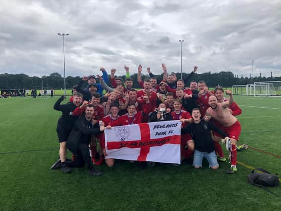 Newlands Park celebrate their NRCFA Sunday Challenge Cup final win