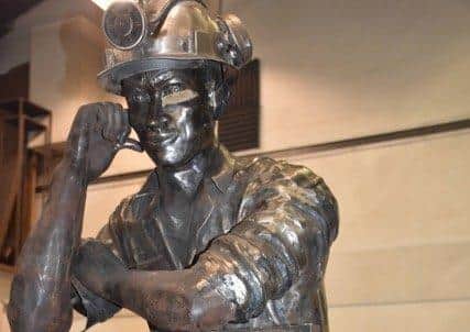 The miner statue is made out of galvanised steel.