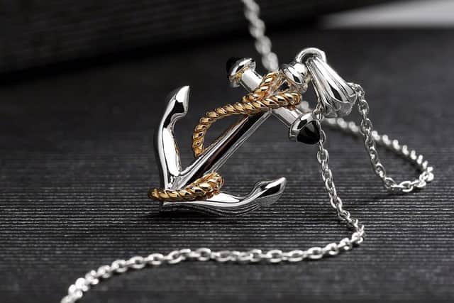 Close-up of the donated anchor necklace worth £225 from W Hamond, Whitby, which will be auctioned on Saturday