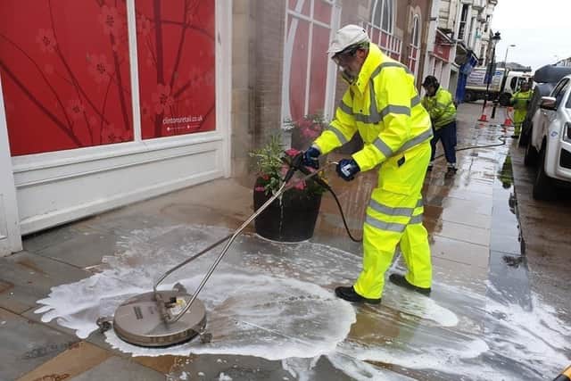 Cllr Tony Randerson cleaning.