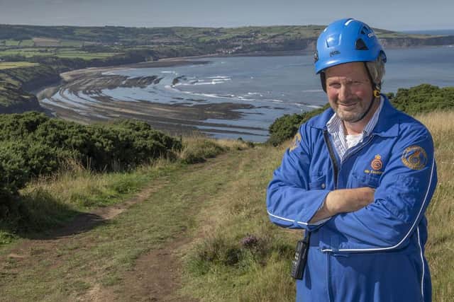 Anthony White with Ravenscar beach behind