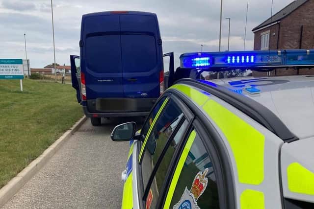 Police stopped this blue van and found the driver tested positive for cannabis and cocaine.