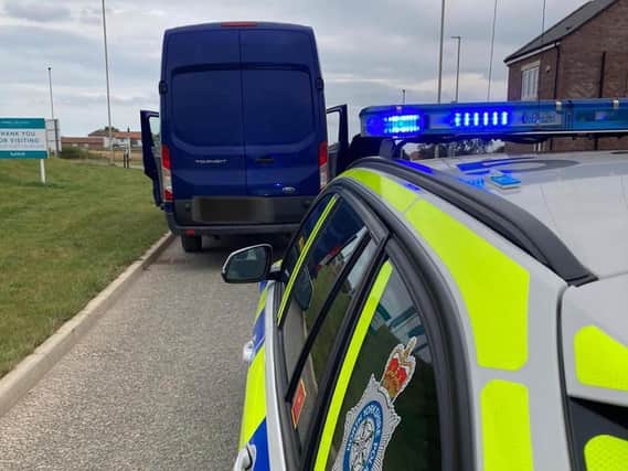 Police stopped this blue van and found the driver tested positive for cannabis and cocaine.