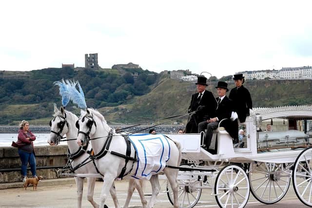 Thalia's coffin was carried in a horse-drawn carriage