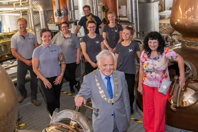 Cllr Jim Clark is pictured with staff at the Spirit of Yorkshire distillery in Hunmanby. Photo submitted