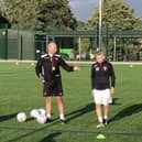 Dylan Cogill with boss Darren Kelly at a Boro training session