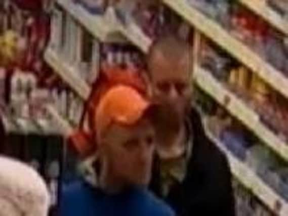 Police want to speak to these two men after candles were taken from B&M in Whitby.